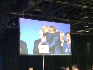 Two Southern Baptist pastors embrace in an emotion display of unity. 